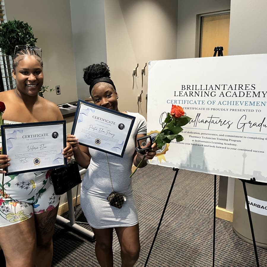 A Brilliantaires graduate celebrating with her certificate