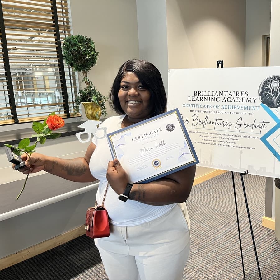A Brilliantaires graduate on certification day
