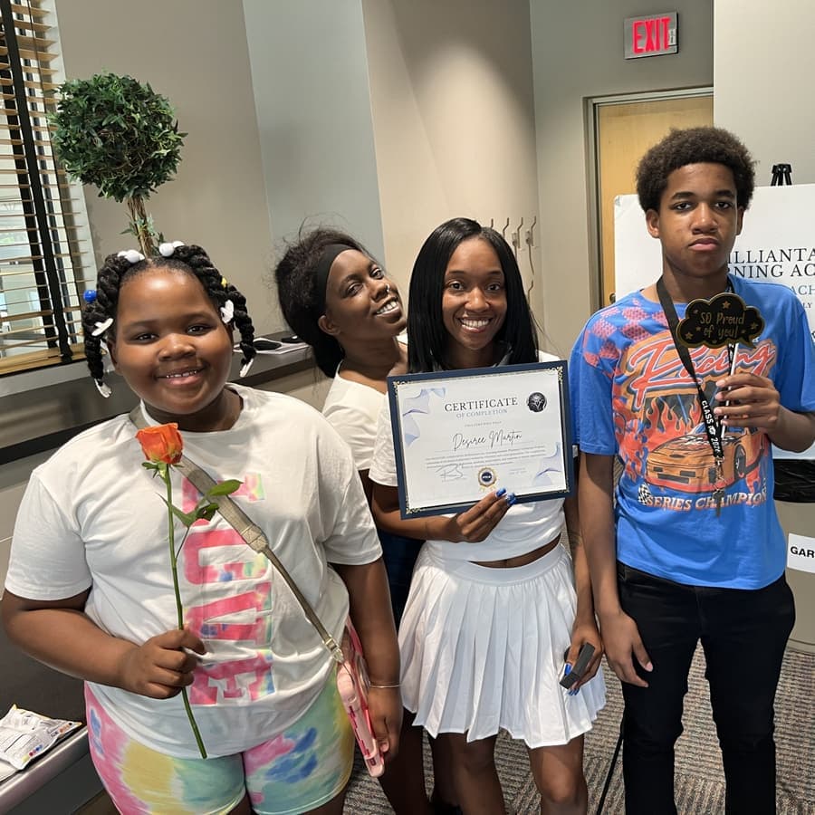 A Brilliantaires graduate on certification day
