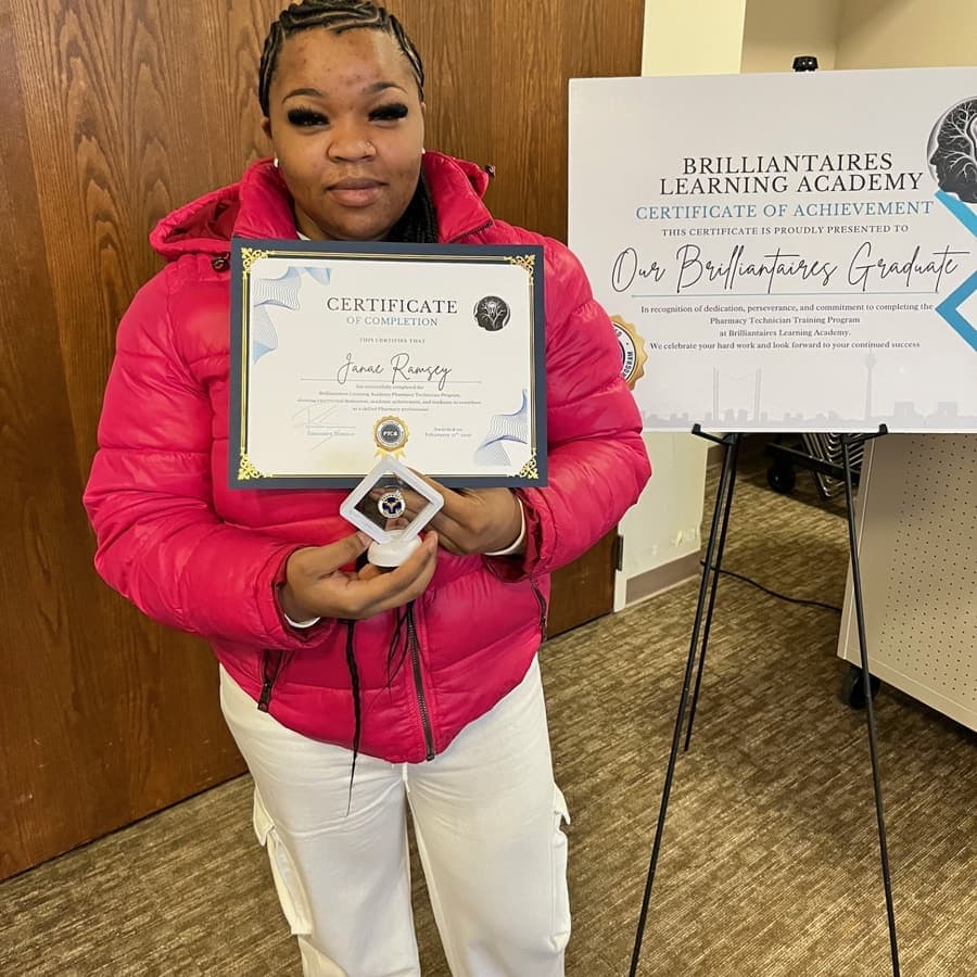 A Brilliantaires graduate on certification day