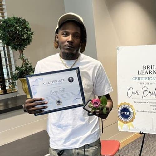 A Brilliantaires graduate on certification day